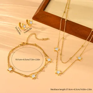 Detailed view of gold-plated stainless steel star jewelry set with product dimensions