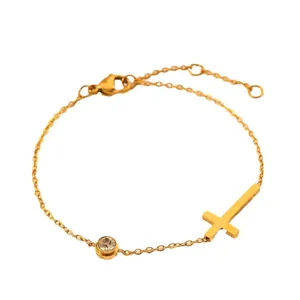 Elegant 18k gold plated titanium steel bracelet with horizontal cross and crystal accent