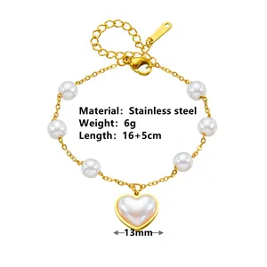 Elegant gold-plated stainless steel pearl bracelet featuring a charming heart-shaped pendant.