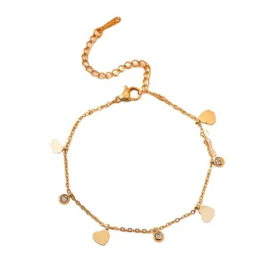 Elegant titanium steel bracelet with gold heart charms and sparkling crystals