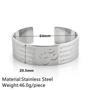 Macro view of stainless steel cuff bracelet with Om symbol and engraved script details