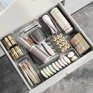 Clear smoke grey fluted drawer organizer bins for makeup vanity and cosmetic storage