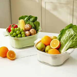 Double-layer kitchen drain baskets filled with fresh fruits and vegetables on a marble counter