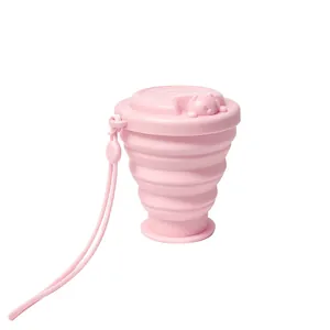 Portable pink collapsible silicone travel cup with cute bear lid and handy carrying strap
