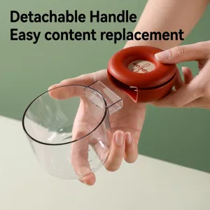 Taza medidora de cocina transparente con escala graduada y mango rojo desmontable