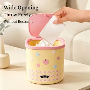 Mini desktop trash can with pop-up lid and cute polka dot design for home or office