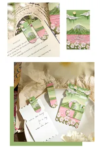 Detailed view of artistic oil pastel style magnetic bookmarks on book and card