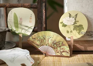 Detailed shot of traditional Chinese style fan-shaped decorative cards for DIY journaling
