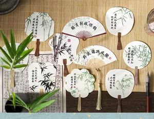 Detailed view of traditional Chinese calligraphy fan cards with bamboo ink painting