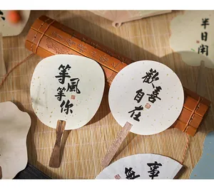 Macro view of Chinese style fan-shaped calligraphy decorative cards for DIY scrapbooking
