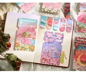 Close-up of artistic oil painting magnetic bookmarks decorated in a notebook journal.