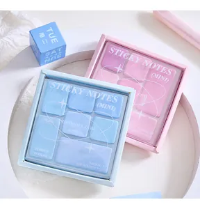 Close-up van een set mini-plaknotities geïnspireerd op een oogschaduwpalet in blauw en roze