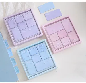 Geselecteerde pastelkleurige Starlight Coral serie plaknotities in paars, roze en lichtblauw.
