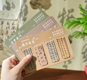 Hand holding retro Chinese style magnetic bookmarks with vintage calligraphy art