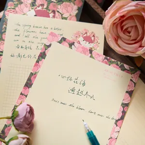 Elegant floral stationery set with gold foil accents and poetic quotes for journaling
