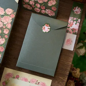 Vintage dark green envelope letter set with gold foil floral patterns and fox sticker.
