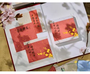Vintage Chinese style red sticky notes with calligraphy and gold foil flowers