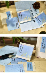 Close-up of creative memo pad with traditional Chinese crane design and gold foil detail