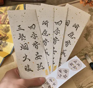 Handheld vintage Chinese calligraphy tags with stickers for creative journaling and scrapbooking