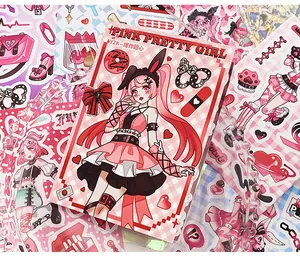 Macro view of Y2K anime girl sticker with heart and bow details for journaling art