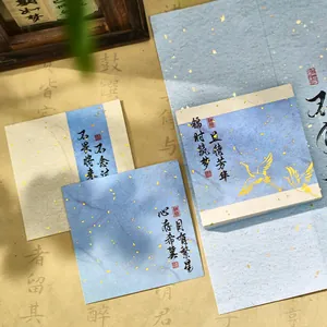 Vintage Chinese style memo pads with gold foil flecks and traditional crane illustrations