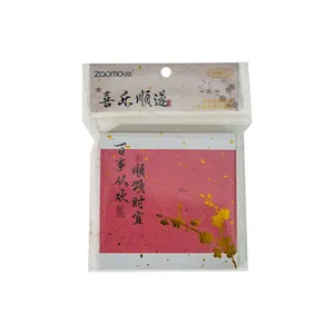 Traditional Chinese style red memo pad with gold floral design and calligraphy
