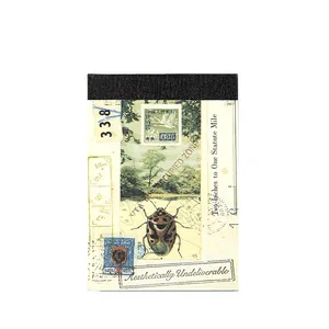 Cuaderno de papel para scrapbooking vintage con sello antiguo e ilustración de escarabajo