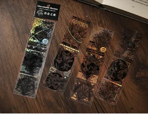Close-up of holographic gold foiled botanical stickers for journaling diy scrapbooking