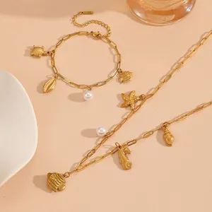 Gold marine theme jewelry set with starfish turtle shell pearl charms and stainless steel.