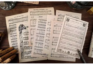Detail view of vintage music sheet scrapbooking paper with aged texture and lyrics