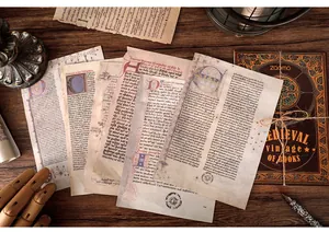 Close-up showing various medieval-style aged paper sheets for vintage scrapbooking