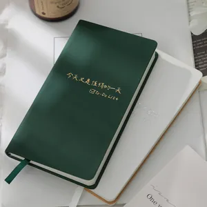 Elegant dark green and white leather notebooks with gold stamped To-Do List text