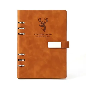 Cuaderno A5 de cuero marrón con anillas, logo de ciervo y frase motivadora grabada