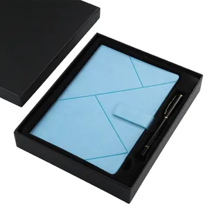 Premium hellblaues Business-Notizbuch und schwarzer Stift in einer Geschenkbox