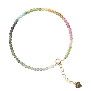 Dainty 2mm rainbow tourmaline beaded bracelet with elegant 14k gold gradient finish