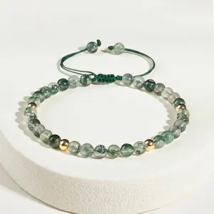 Handcrafted green moss agate beaded bracelet with gold accents for a summer-ready look