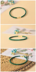 Detailed view of small natural green malachite beaded bracelet with gold clasp