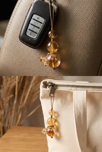 Exquisite natural yellow crystal calabash pendant used as a car key fob and bag accessory