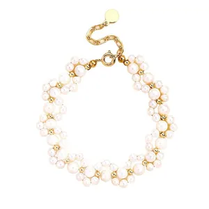 Elegant high-luster white pearl bracelet with 14K gold-filled accent beads and adjustable chain