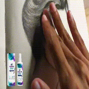 Detail showing professional art fixing spray being applied to a charcoal sketch artwork