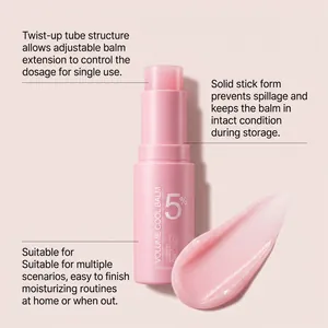 Detail of pink volume cooling balm stick featuring a smooth moisturizing texture smear
