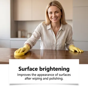 Detailed demonstration of multi-purpose polishing paste brightening a wooden table surface.