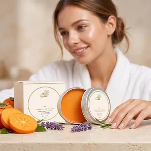 Detail of persimmon soap tin container with fresh fruit slices and lavender sprigs setup