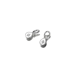 Detail view of 925 sterling silver water drop charms with star stone inlay for DIY jewelry.