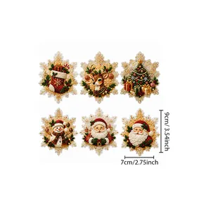 Close-up of DIY diamond painting Christmas snowflake fridge magnets featuring sparkling rhinestones.