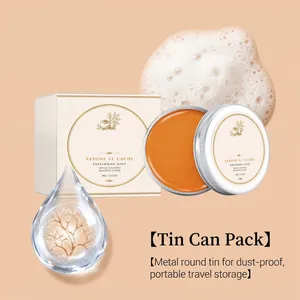 Premium persimmon soap in a portable travel metal tin with gentle cleansing foam detail