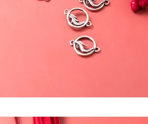 Macro view of matte S925 sterling silver hollow round filigree charms for DIY jewelry