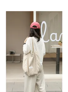 Casual Japanese style polka dot nylon tote bag shown in a lifestyle street setting