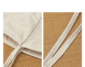 Vue détaillée montrant la texture du tissu en lin naturel et les coutures du sac cabas