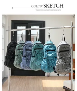 Multiple color options for casual lightweight nylon grid backpacks with bungee cords.